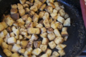 Irving Penn I am not. Sorry about the blurry photo: Just wanted to show desired color for just-right croutons. Check croutons as they bake—one minute too long and they burn. 