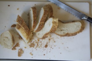 Use Italian, sandwich or any leftover bread. Cut loaf into slices.