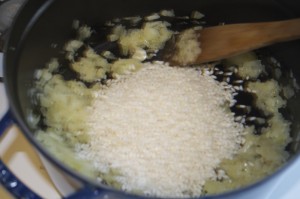 Stir rice into sautéd onions and garlic.