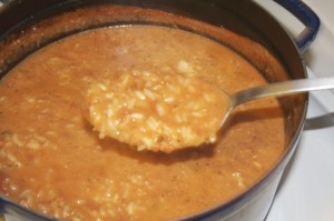 Soup is thick and risotto-like. If made ahead, you may want to heat and thin with small amount of water.