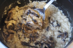 Gently stir into risotto the sautéed mushrooms and their pan juices.