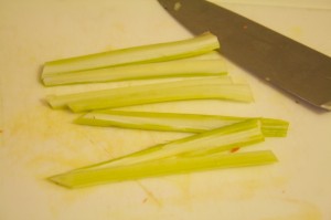 Slice celery in thirds lengthwise and cut in half...