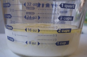 Add milk—eyeball it to see that milk—not butter—comes to 1¾ cups level.