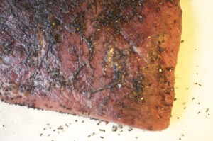 Rub brisket with sea or kosher salt. This is black Hawaiian sea salt.