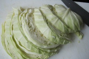 Start by slicing cabbage.