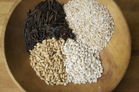 Wild rice, top left, then, clockwise, steel-cut oats, barley and wheat berries.